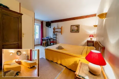 Guest room with twin beds and a garden view.