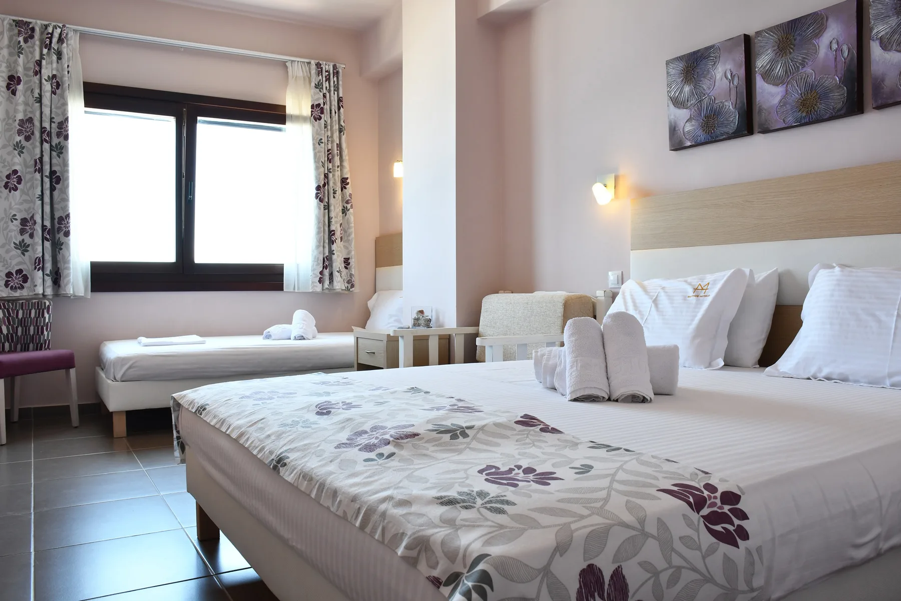 Habitación triple con vistas al mar