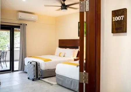 Hotel room with two beds.