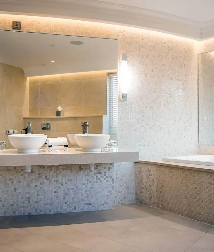 Hotel bathroom with modern fixtures.