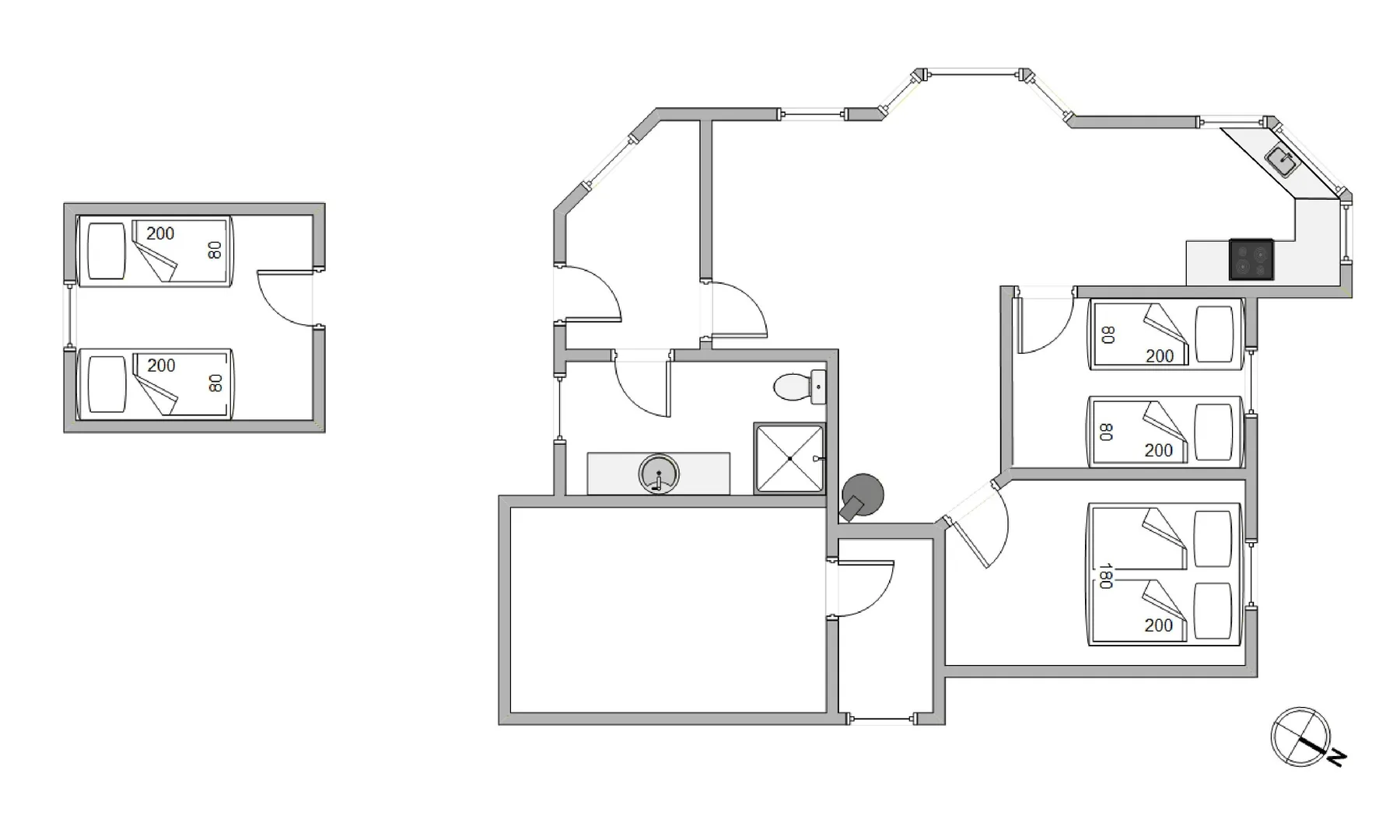 Plano de planta con varias habitaciones, zonas para dormir y un baño central.