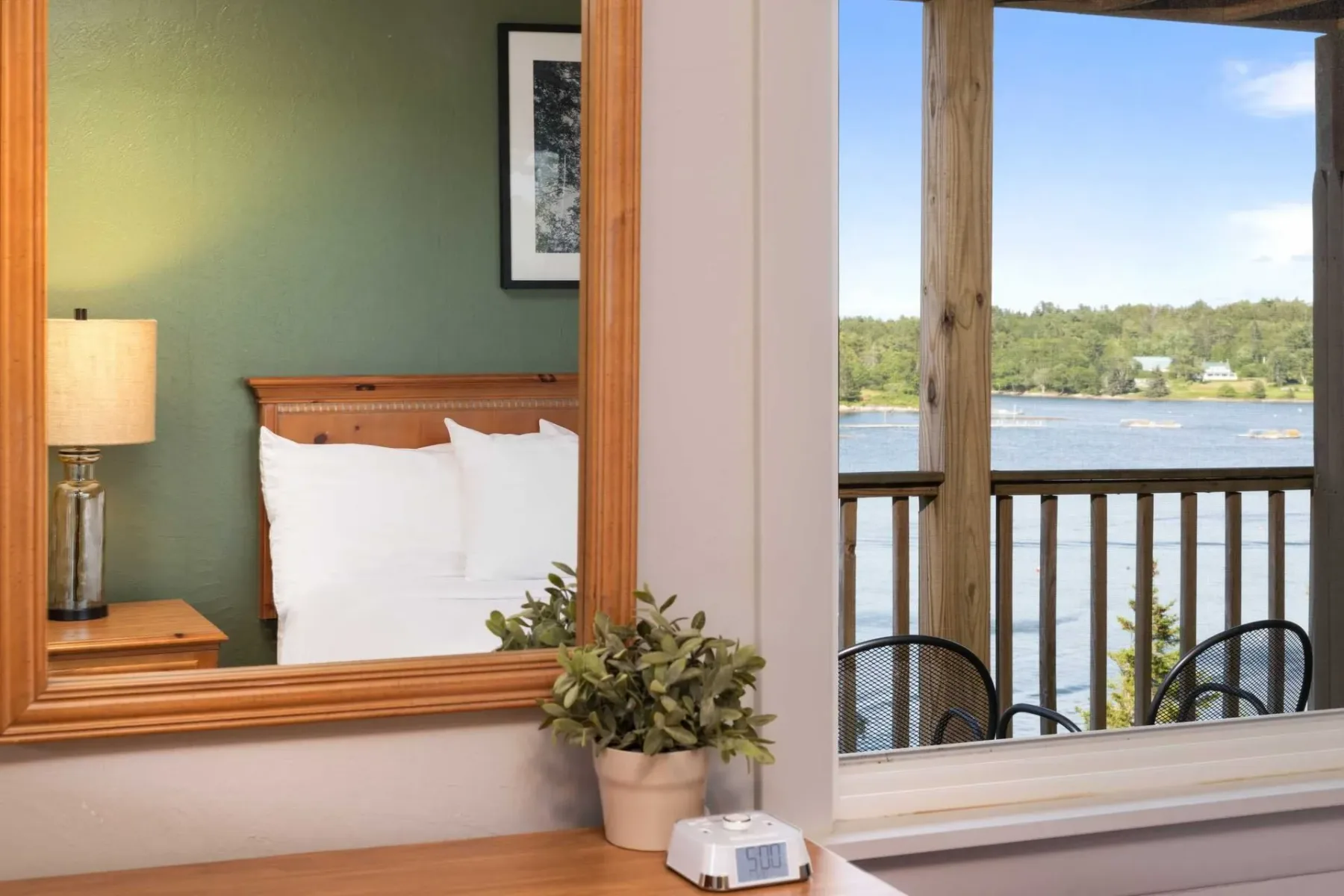 Bedroom with a view toward the balcony.