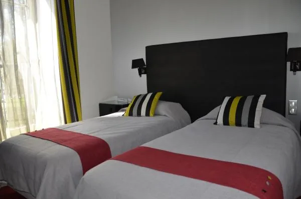 Habitación con dos camas individuales en Orleans