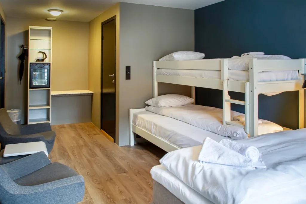 Family room with king-size bed and bunk bed