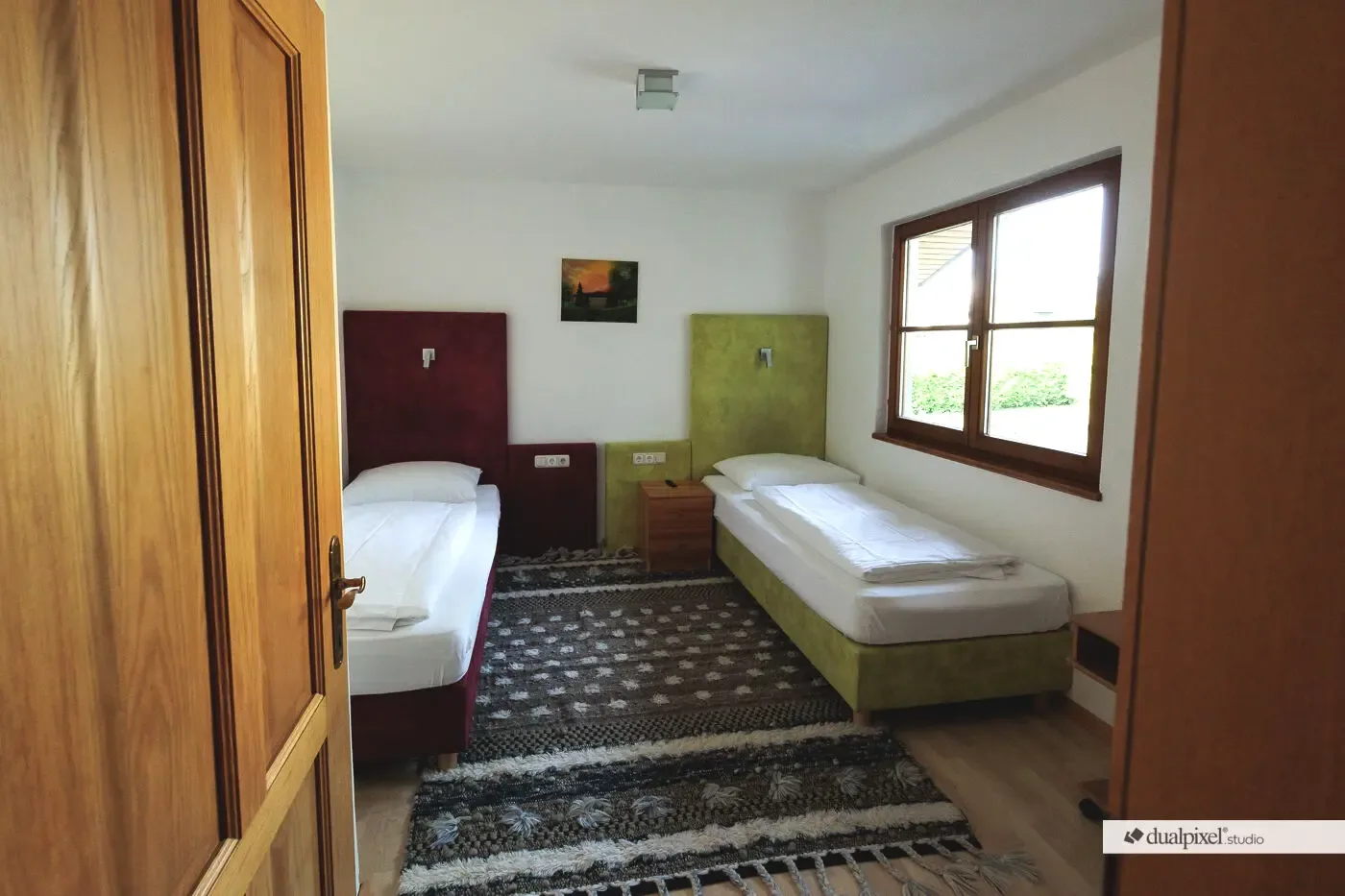 Holiday-house bedroom with two separate beds