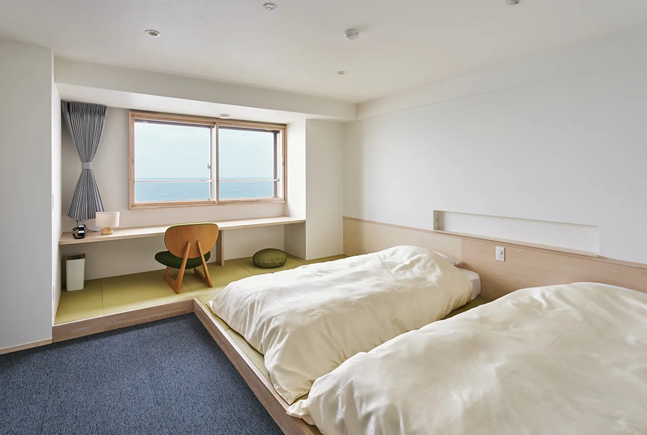 Nueva habitación de estilo japonés-occidental con dos camas individuales