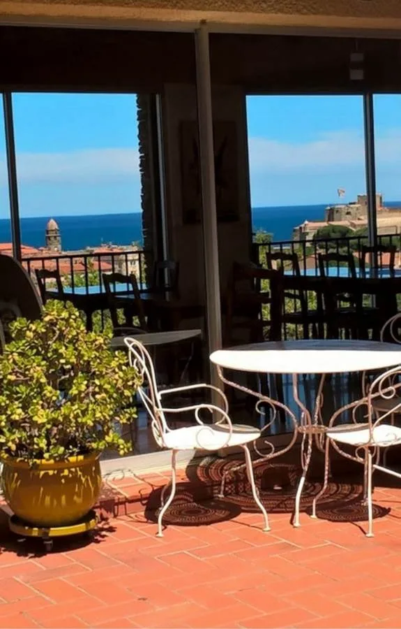 Sunny terrace overlooking Collioure and the sea