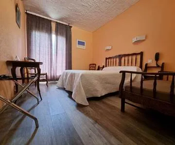 Guest room with a large bed
