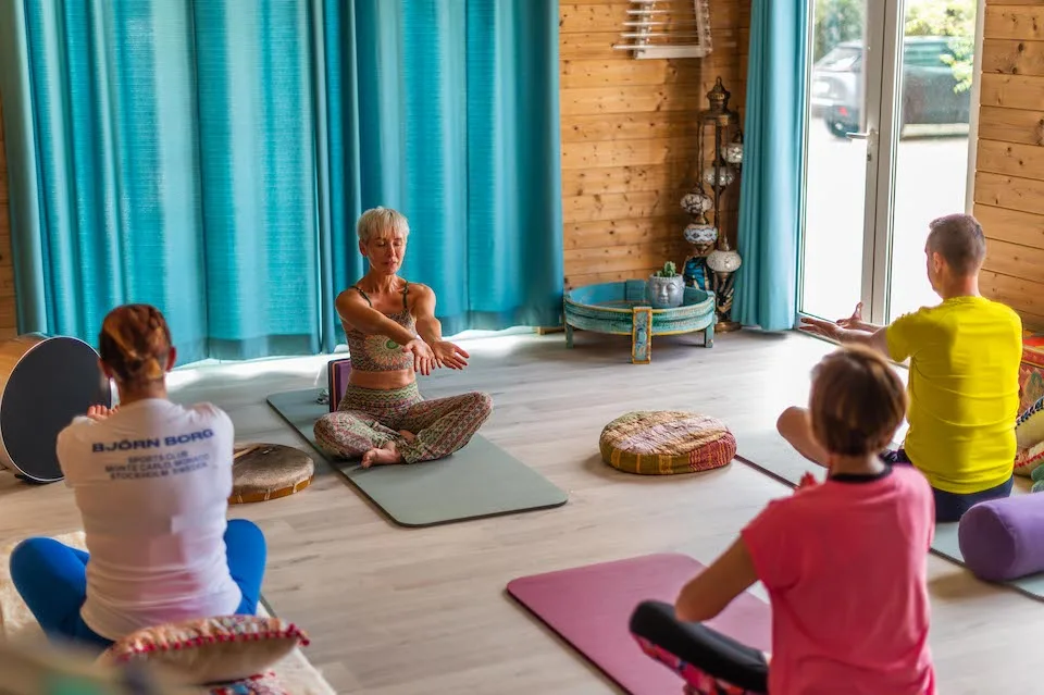 Guests practicing outdoor yoga.