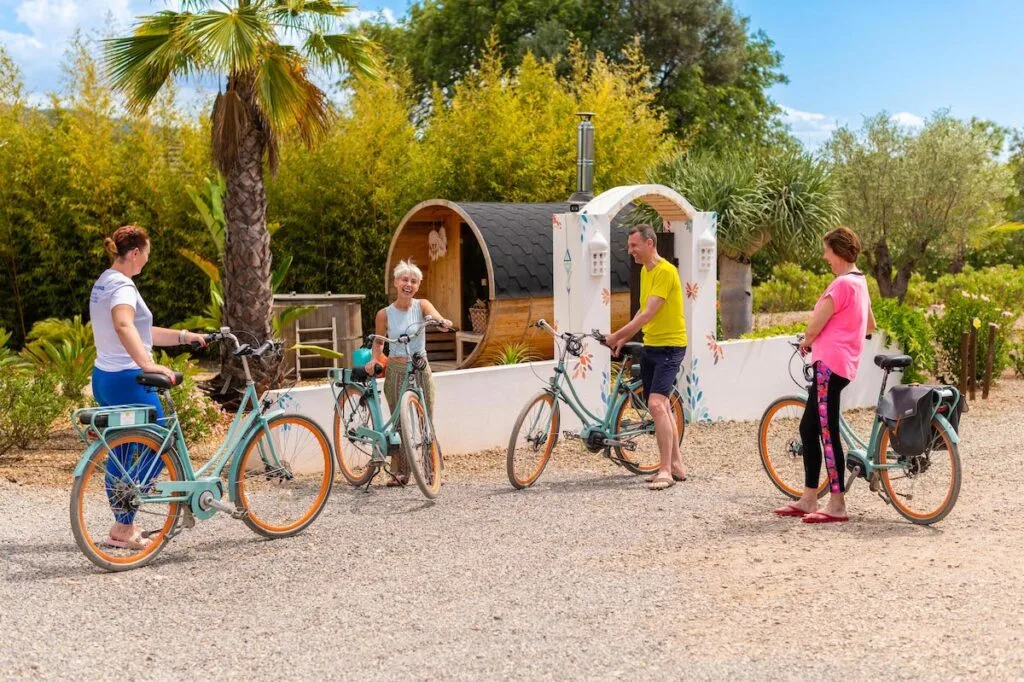 Guests riding rental electric bikes.