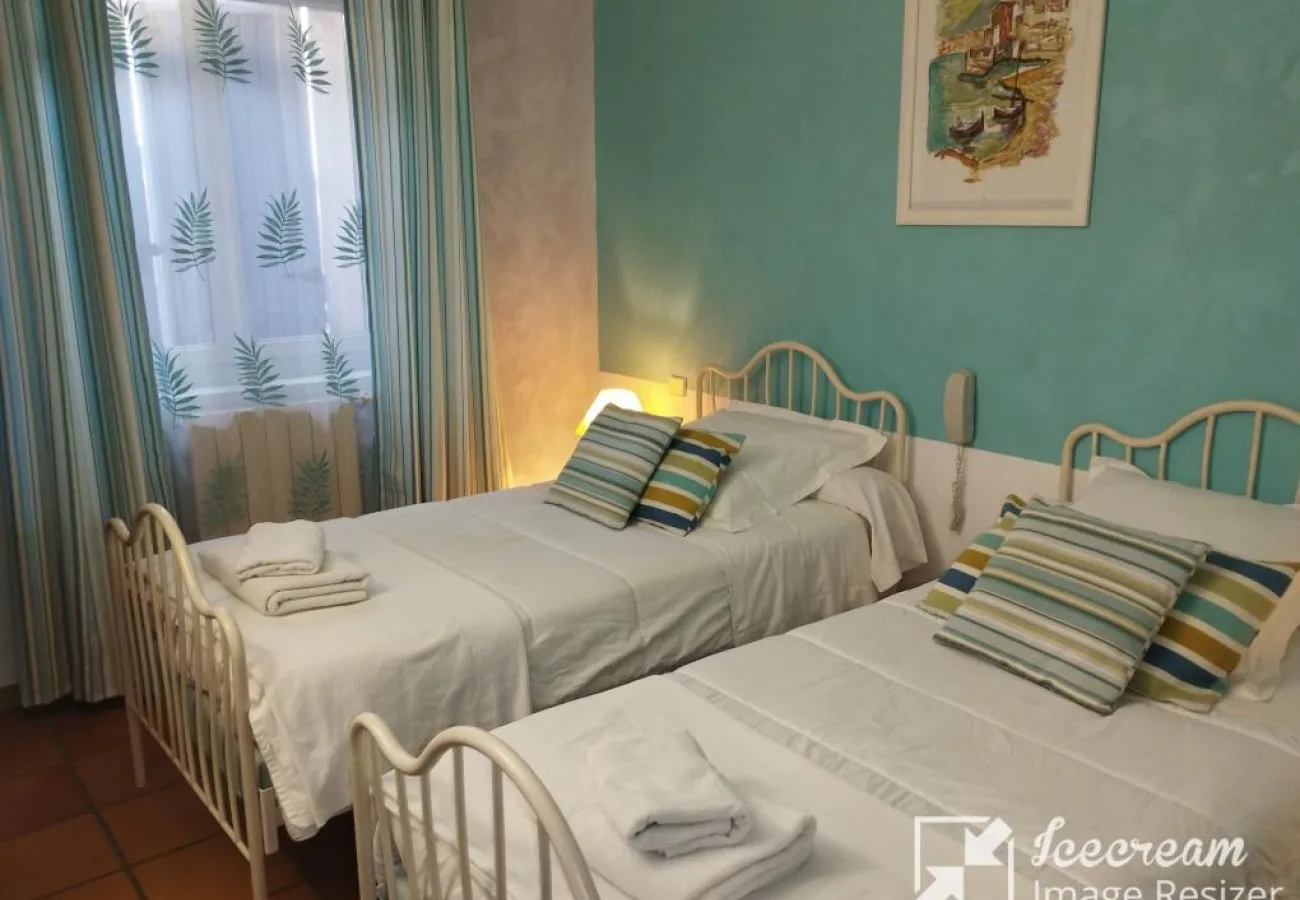 Habitación con dos camas individuales