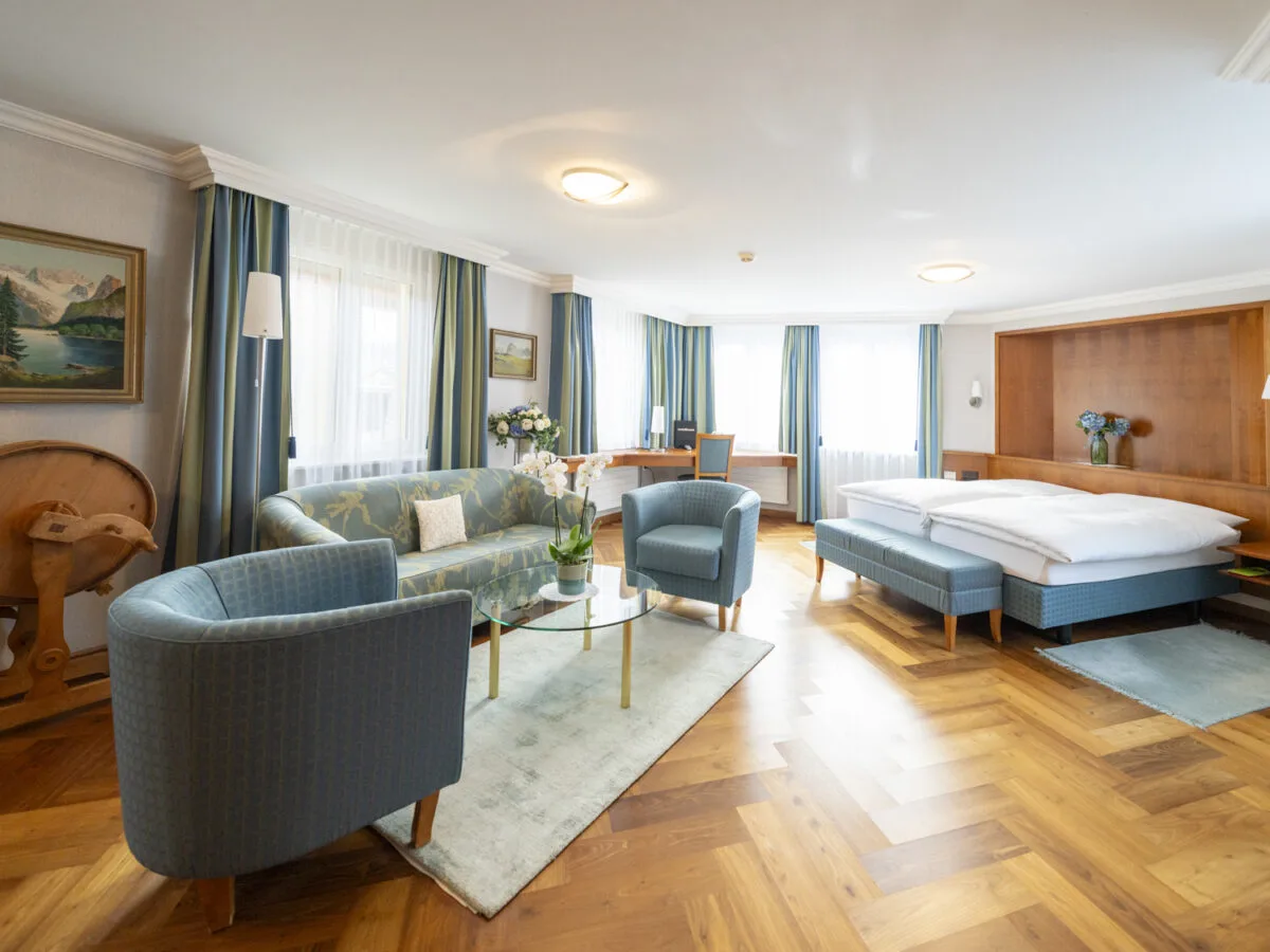 Family Suite with a sitting area and a sleeping alcove.