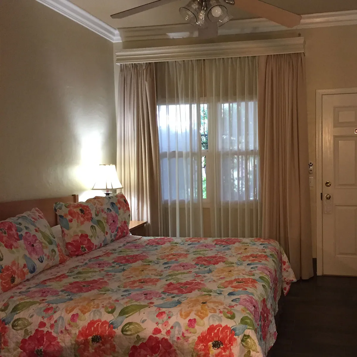 Patio room with king bed and window