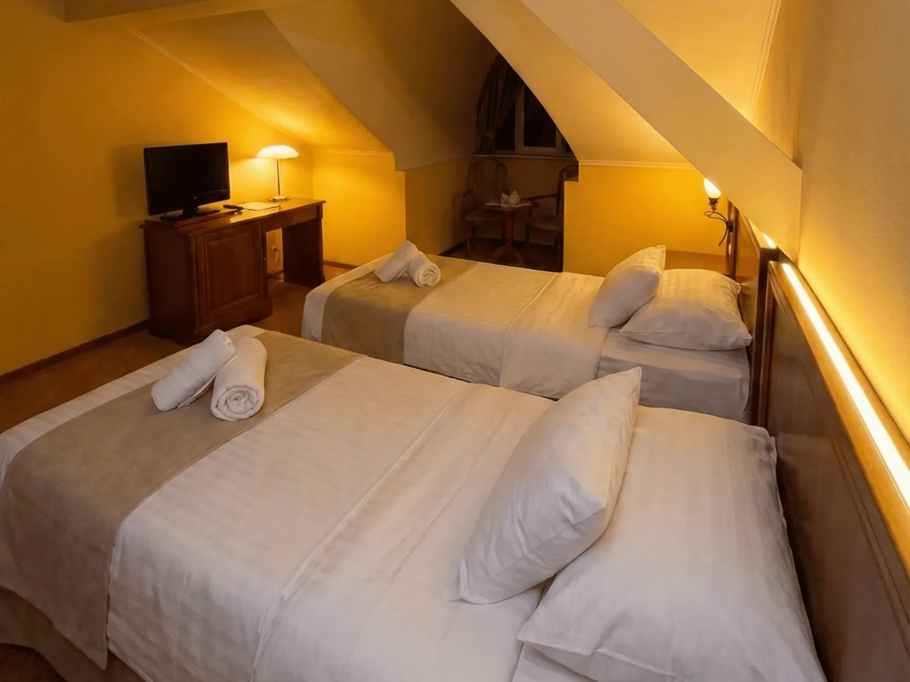 Hotel room with large bed and city view