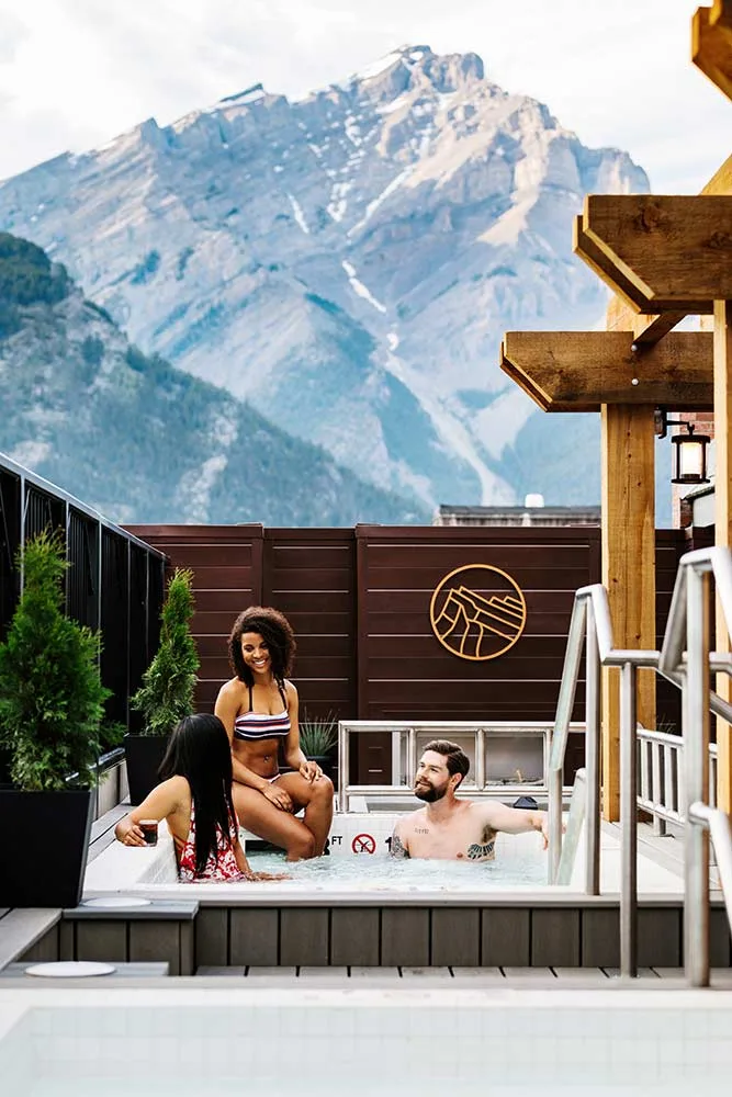 Rooftop hot tubs and lounge seating.