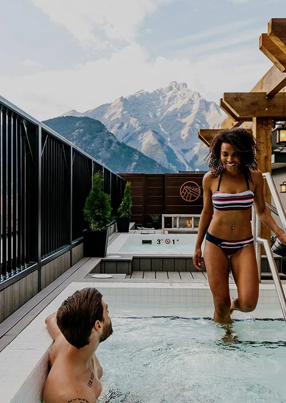 Rooftop hot tub with mountain views.
