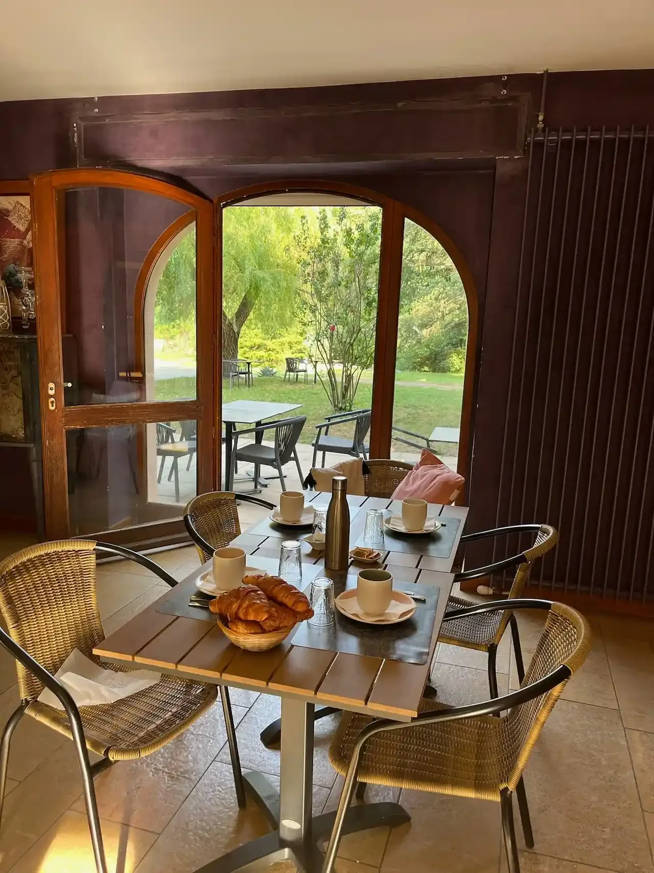 Breakfast setting by a window.