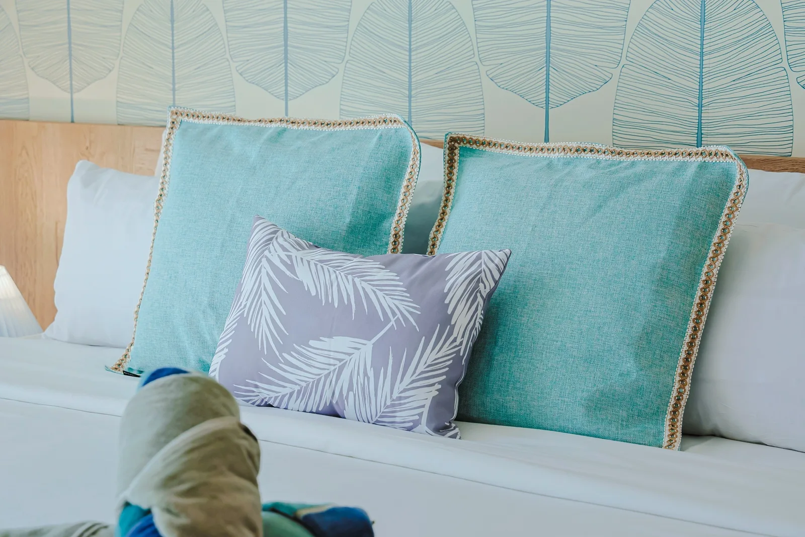 Sink into fresh linens and plush pillows styled with a coastal palette. Your restful escape starts with crisp bedding and soothing decor that invites you to unwind.