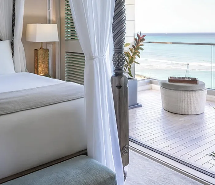 Penthouse Diamond Suite bedroom with an ocean view.