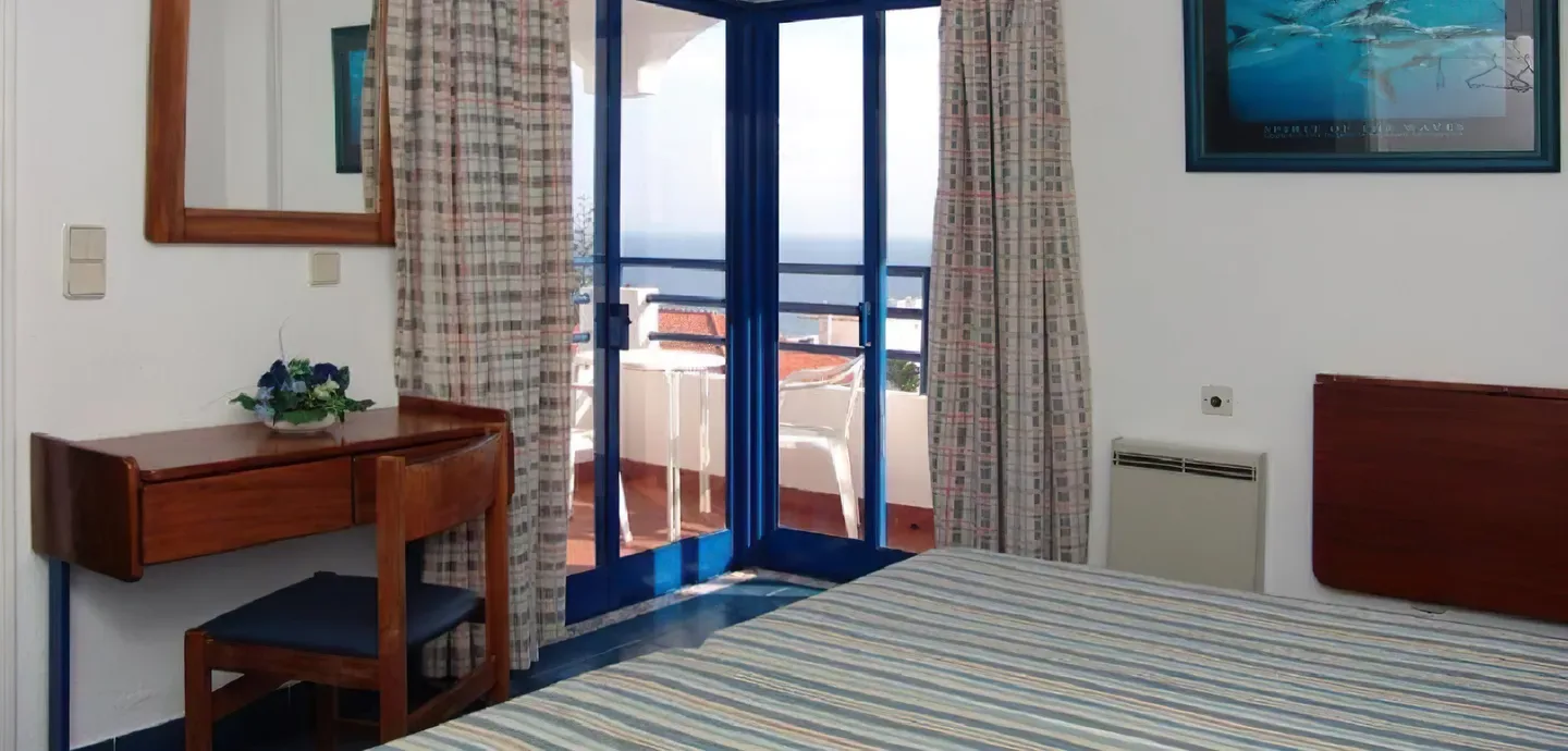Twin room with balcony and sea view