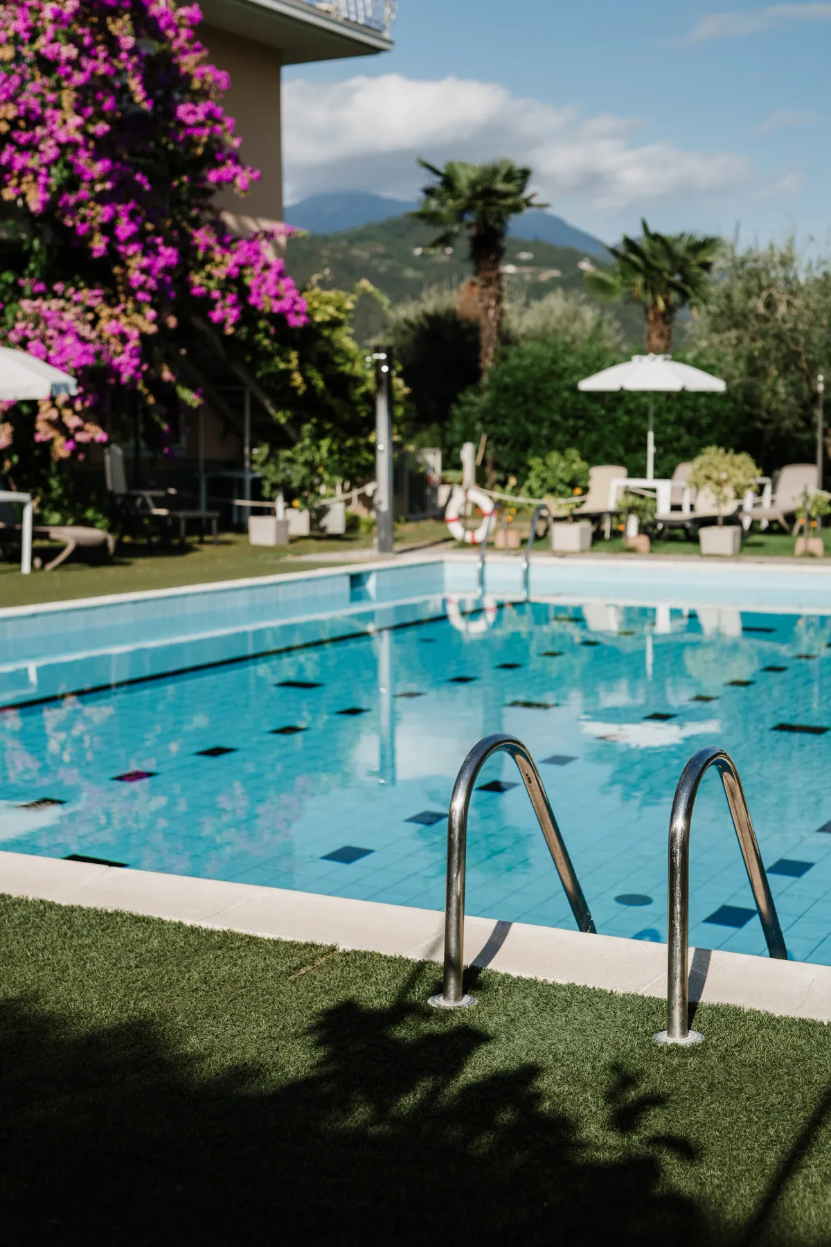 Hotel pool, flowers and mountain view