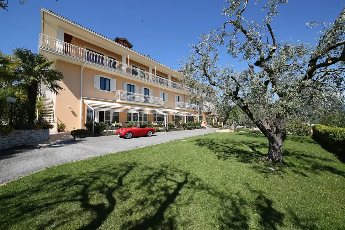 Hotel facade and parking area