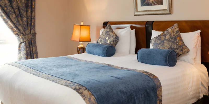 Dormitorio en Villa Rose Hotel