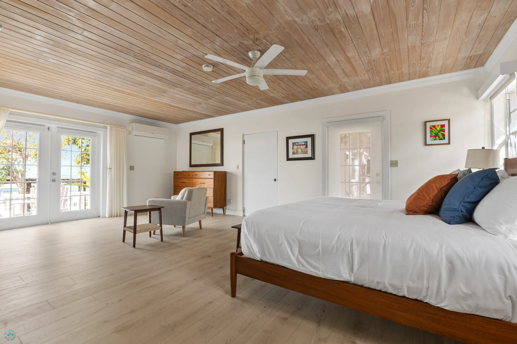 The Suites bedroom with balcony access