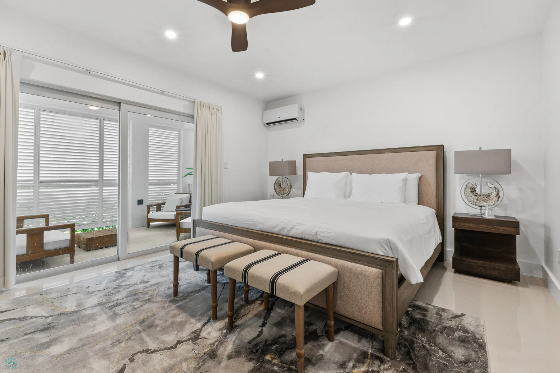 The House master bedroom with king bed