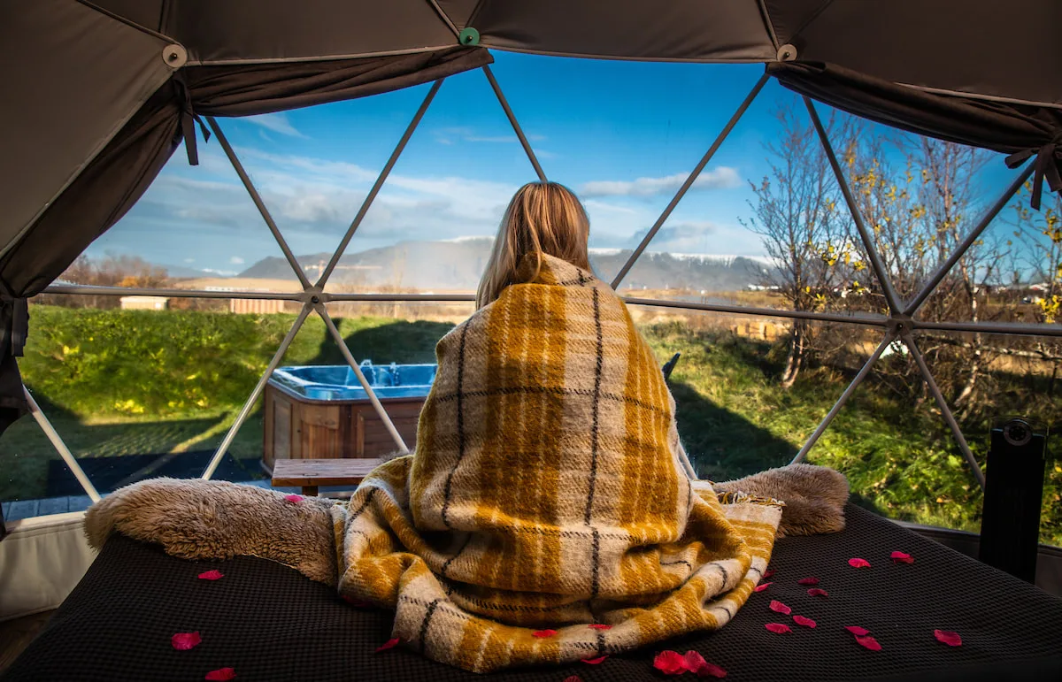 Guest looking out of a dome window
