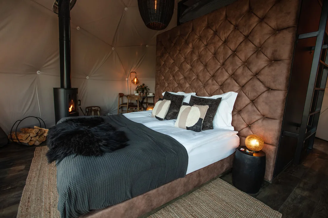 King Suite with tufted headboard