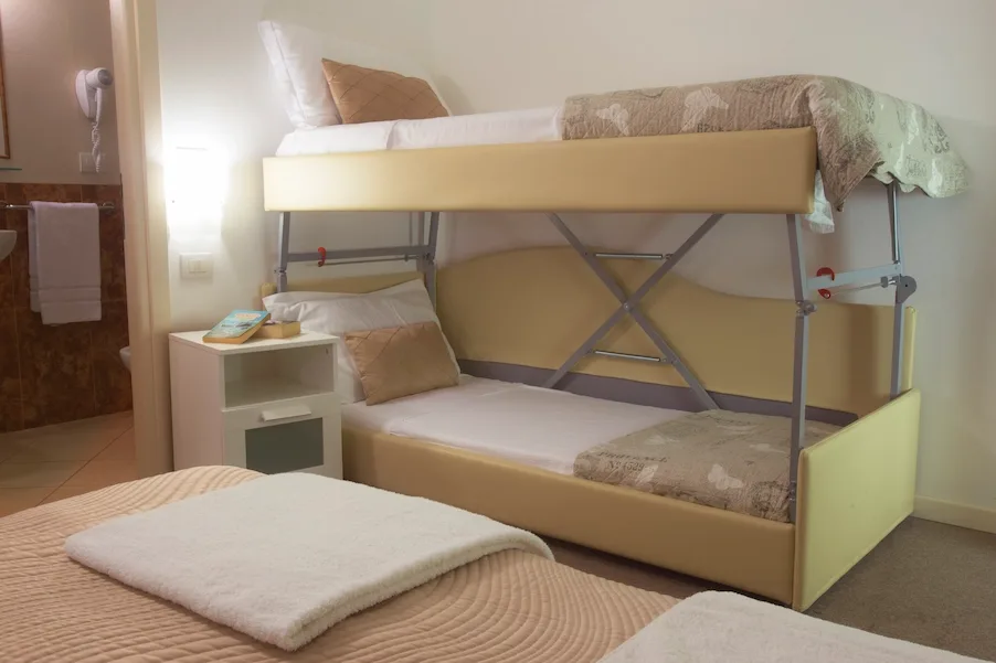 Room with bunk beds and bathroom