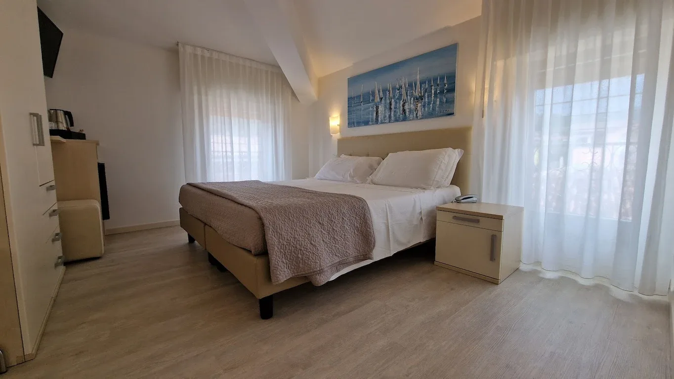 Bright bedroom with double bed