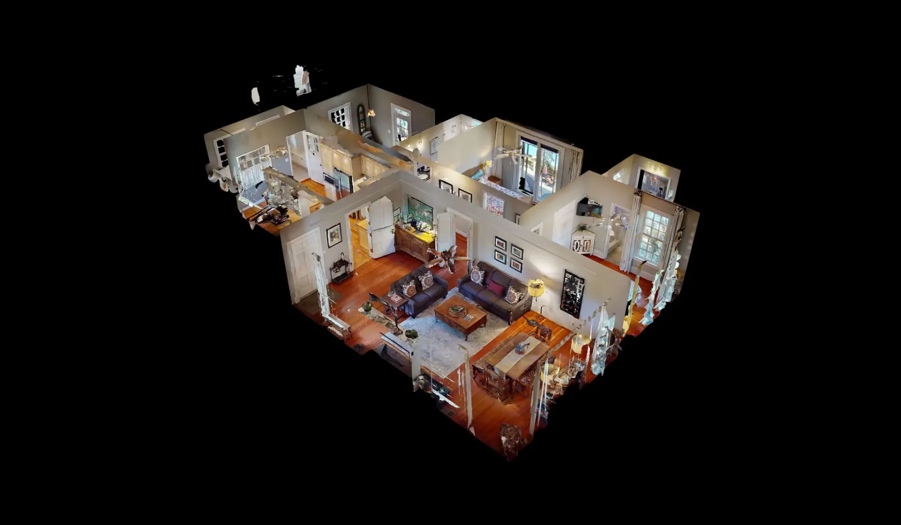 Una vista en corte muestra una vivienda amueblada con áreas conectadas y dormitorios.