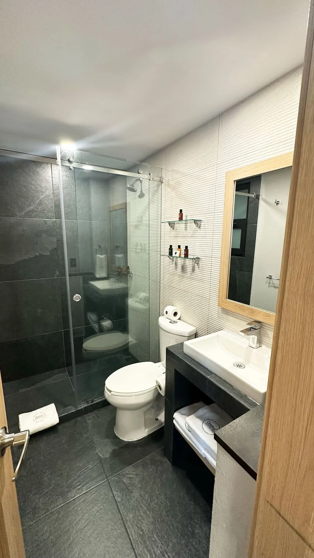 Standard room with three double beds, interior view