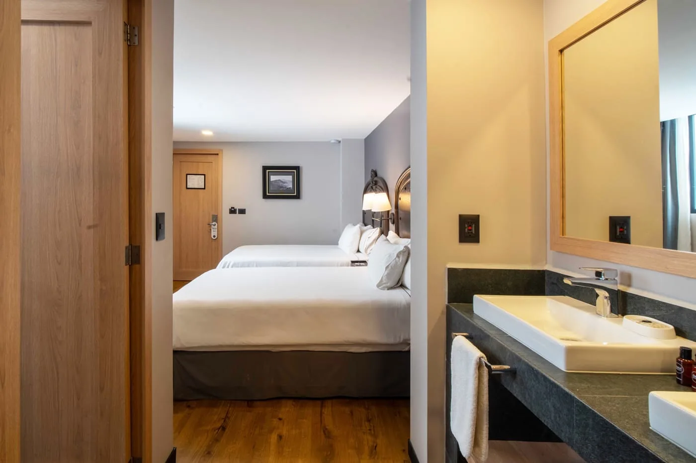 Deluxe room with two double beds, interior view