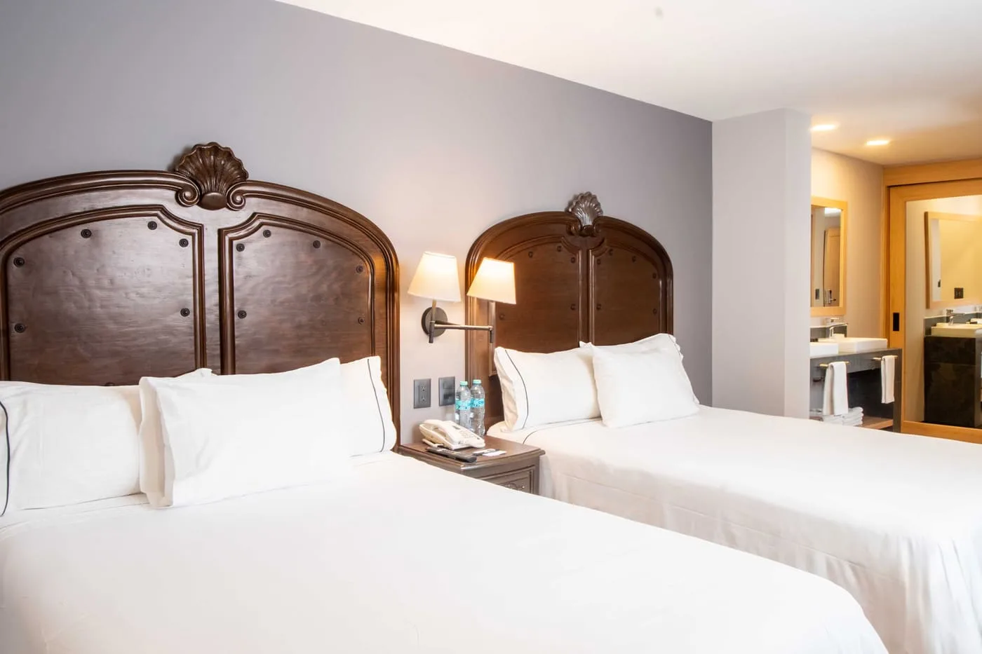 Deluxe room with two double beds, interior view
