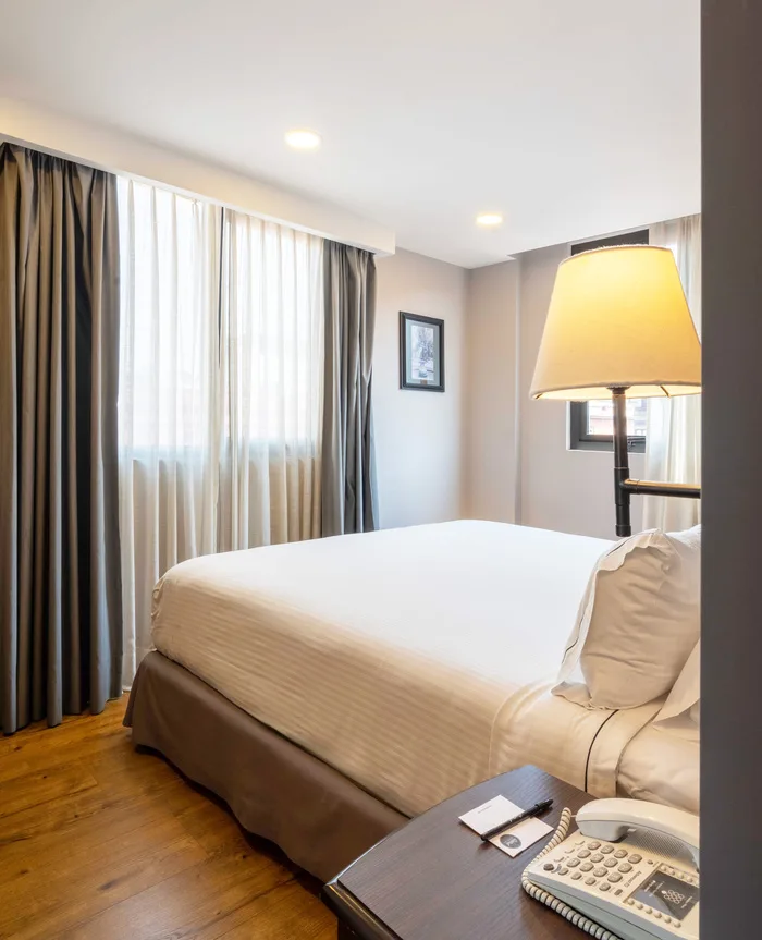 Deluxe room with king bed and city view