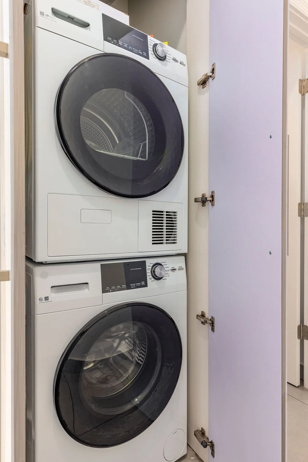 Convenient in-unit laundry with a stacked washer and dryer keeps your vacation wardrobe fresh and ready for every adventure.