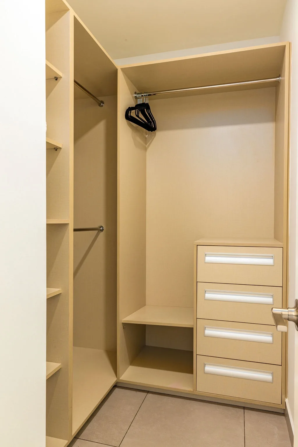 Your private wardrobe offers generous hanging space and storage drawers to keep your belongings organized during your stay.