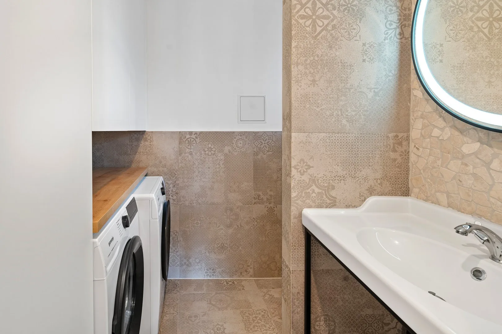 A convenient toilet, a washing machine, and a dryer on the ground floor.