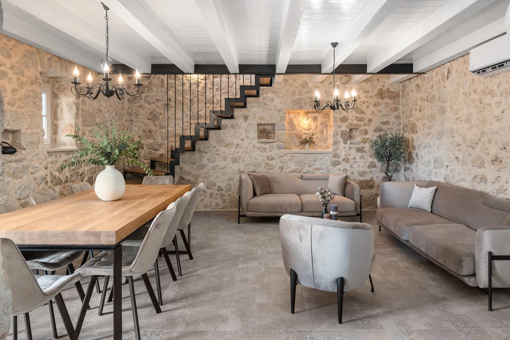 The main house welcomes you with a cozy kitchen