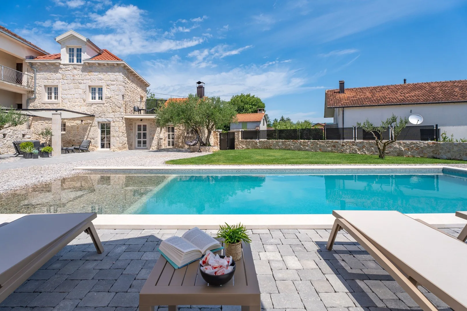 Experience the charm of the Holiday Stone Villa Mara, a delightful retreat nestled on a 900 sqm fenced private plot