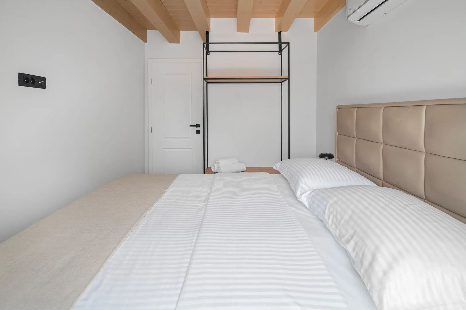 Bedroom No2 offers a luxurious king-size bed