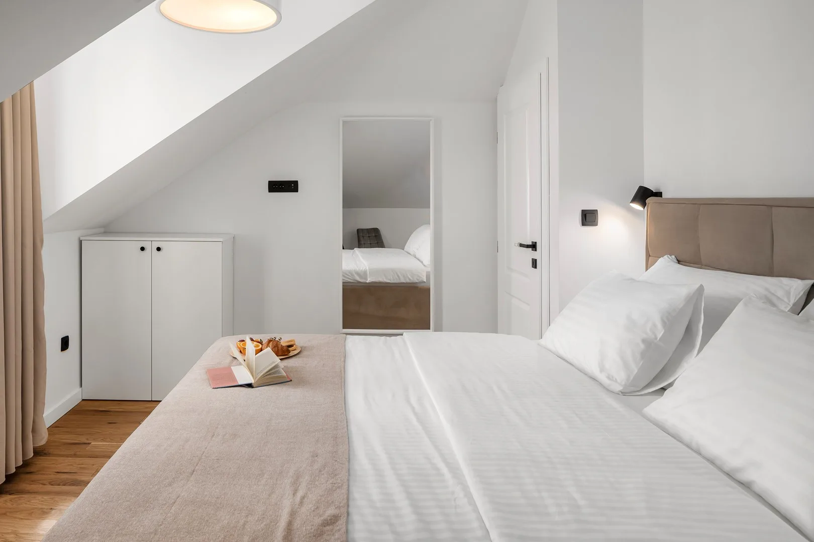 Venture up to the attic to discover Bedroom No3 offering king-size bed