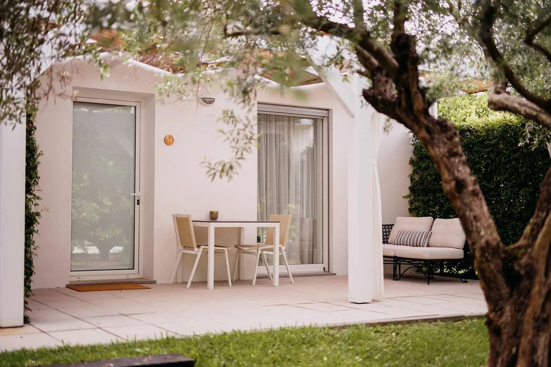 Outdoor terrace with garden furniture.