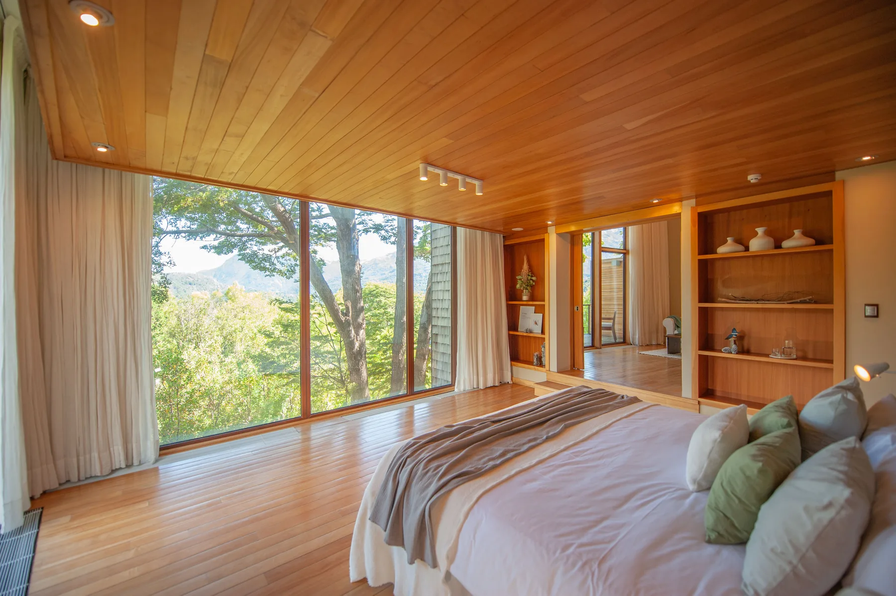 Uman Lodge suite interior with mountain views