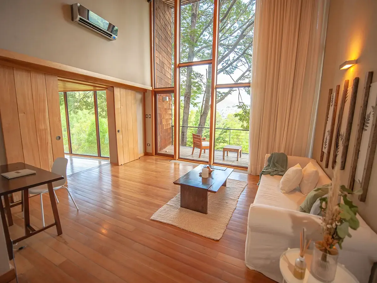 Master Suite separate living room with balcony and high ceilings