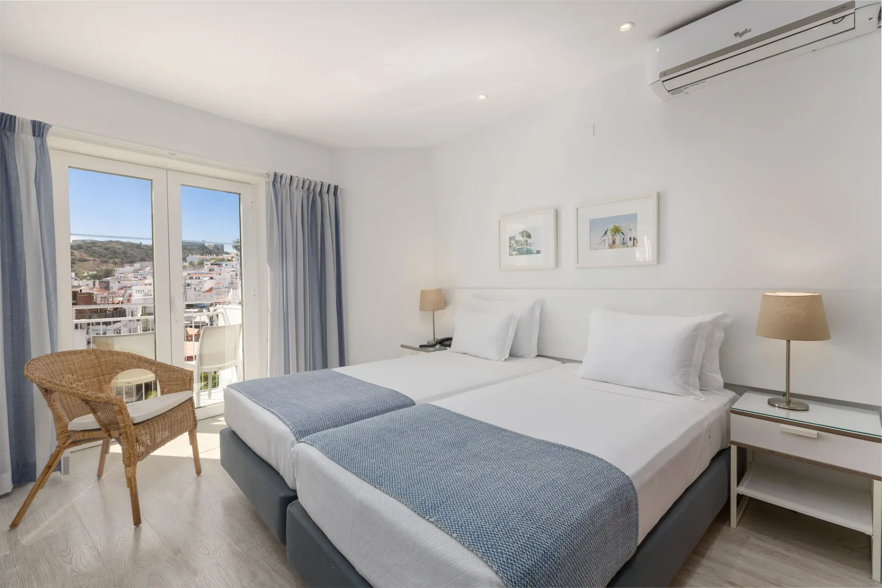 Hotel room with two beds and a table