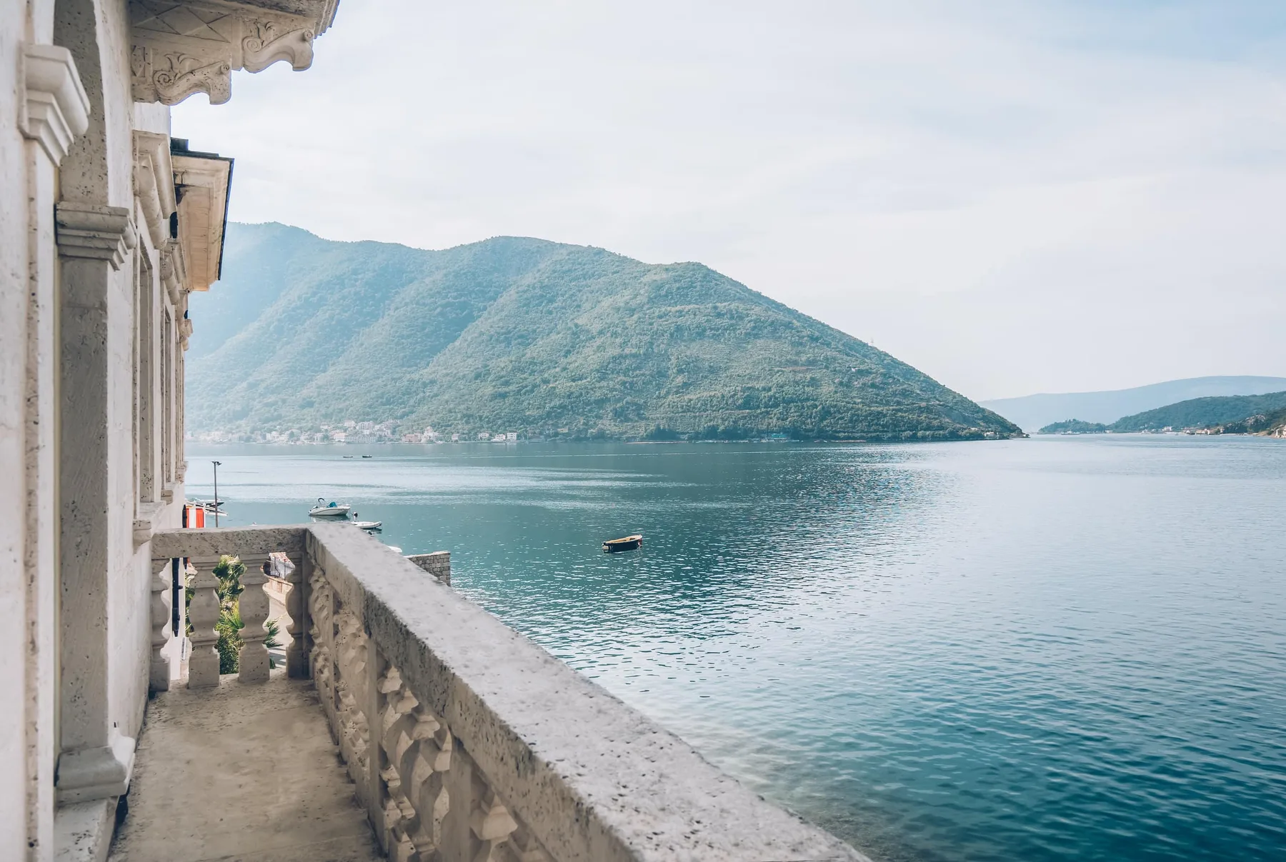 View from the balcony over the sea and mountains